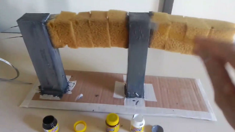 VIGA BIAPOIADA COM LANCE EM SUSPENSÃO